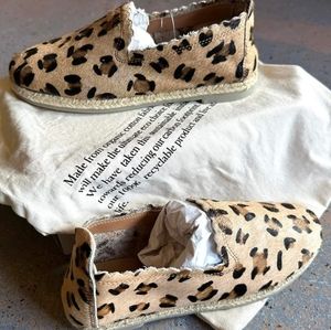 Myra hair on hide animal print leather slip on shoes.